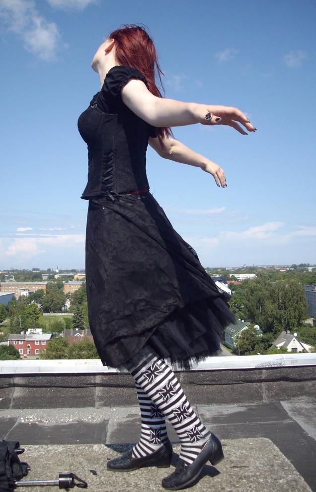 Redhead Gothic Girl wearing White and Black Opaque Pantyhose and Black Shoes